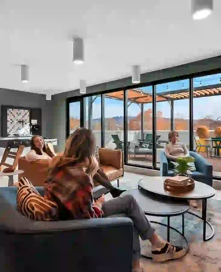 Sky Lounge with foosball table, lounge seating, and kitchen